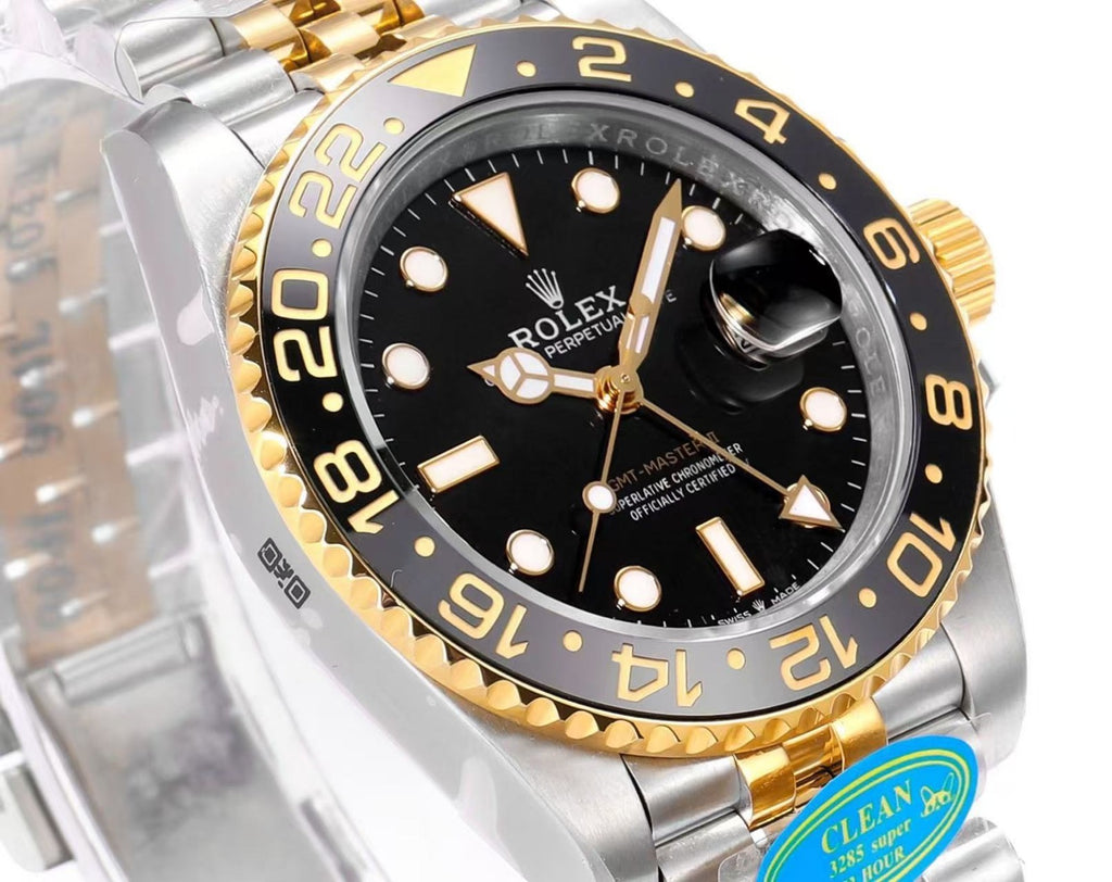 Rolex GMT‑Master II -
“Black & Gold”